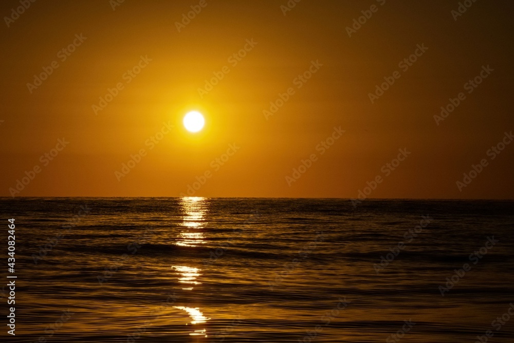 sunset and dramatic sky over the Mediterranean sea during golden hour sunset and dramatic sky over the Mediterranean sea during golden hour