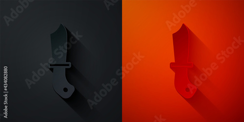 Paper cut Military knife icon isolated on black and red background. Paper art style. Vector