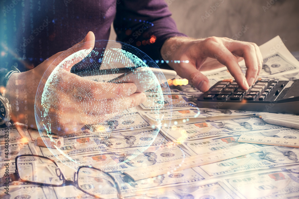 Fototapeta premium Multi exposure of man's hands holding and using a digital device and map drawing. International business concept.