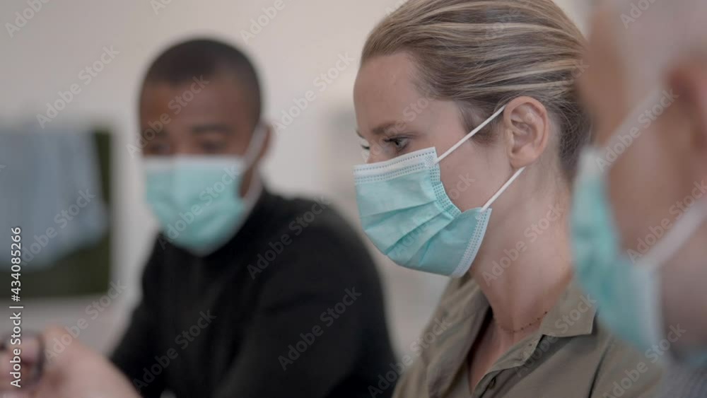 Business people in a work meeting during pandemic Business people in a work meeting during pandemic