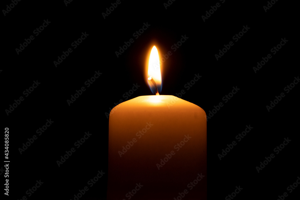 Fire candles on a black background, side view Fire candles on a black background, side view