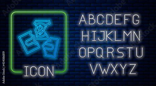 Glowing neon Tearing apart money banknote into three peaces icon isolated on brick wall background. Neon light alphabet. Vector