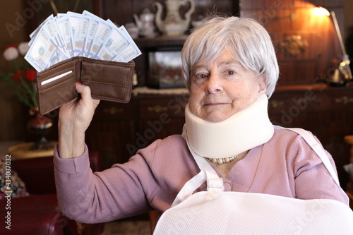 Senior woman receiving compensation after work accident 