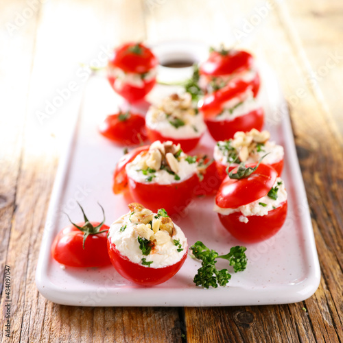 cherry tomato stuffed with cheese and walnut