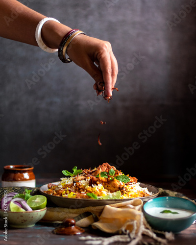 Hyderabadi Chicken Biryani with Fried onions photo