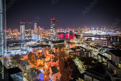 Wallpaper Mural London, UK.  London at night, view at East part of capital,  include river Thames and Exhibition centre.  Torontodigital.ca