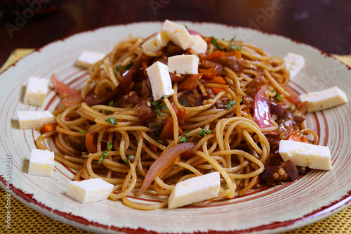 Plate of Tallarin Saltado, a Popular Peruvian Stir Fried Noodles with Beef  photo