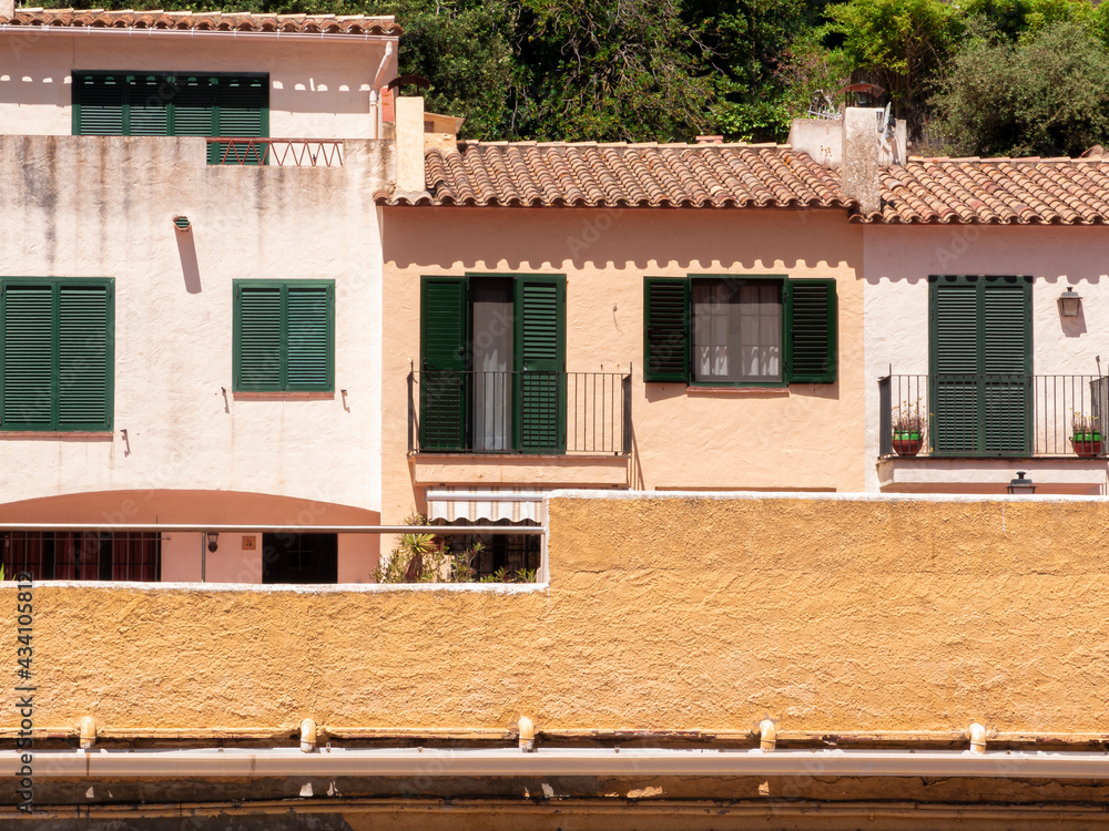 facade of a summer house in the town of pals, on the costa brava of girona in spain on the mediterranean sea facade of a summer house in the town of pals, on the costa brava of girona in spain on the mediterranean sea