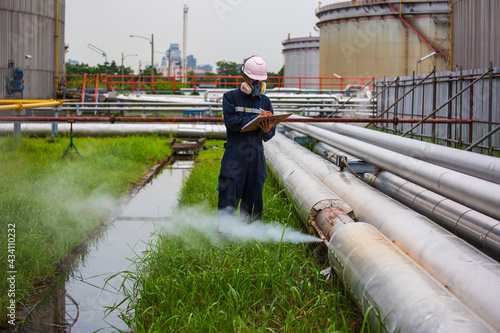 Male worker inspection visual pipeline oil and gas corrosion rust through socket tube steam gas leak pipeline