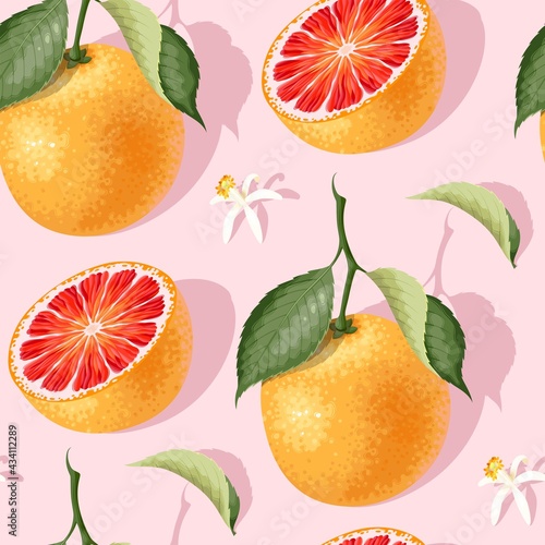 Seamless pattern with grapefruit slices and leaves