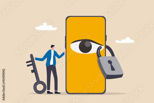 Data privacy for internet user, protect application to track or follow user behavior concept, man holding key after lock the spy eye on smartphone to stop watching private information.
