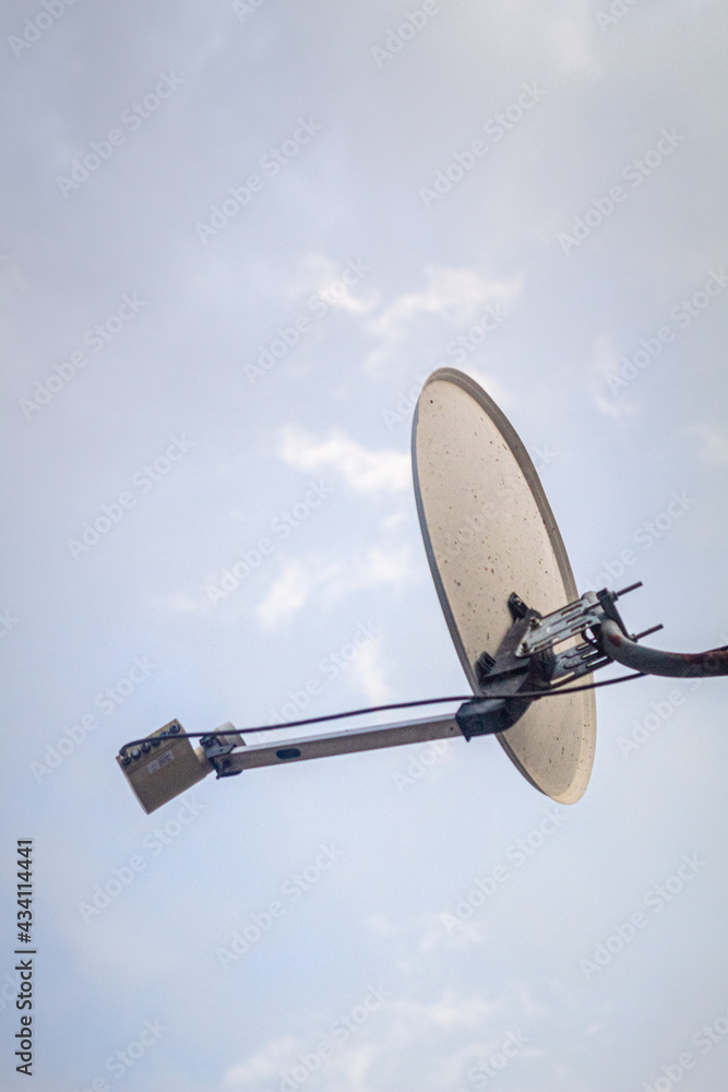 satellite dish antenna on blue sky