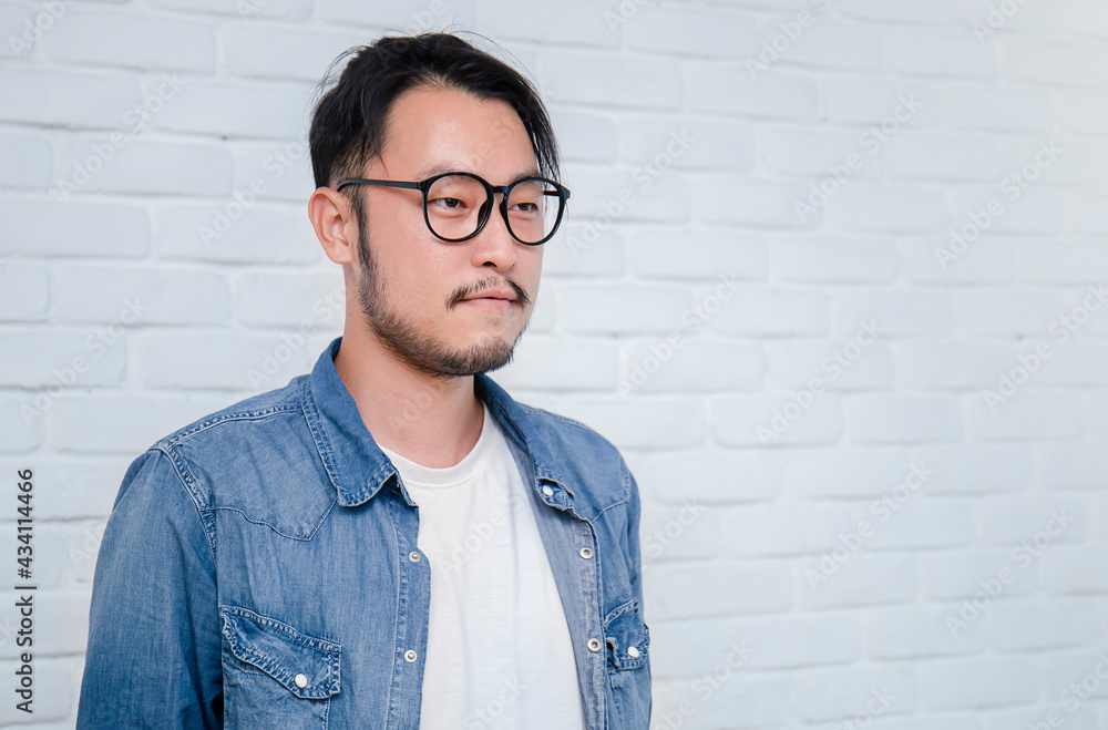 Attractive beautiful positive asian man, close up portrait of asian nerdy guy. Handsome nerd Japanese asia man wearing glasses isolated on white background. Attractive beautiful positive asian man, close up portrait of asian nerdy guy. Handsome nerd Japanese asia man wearing glasses isolated on white background.