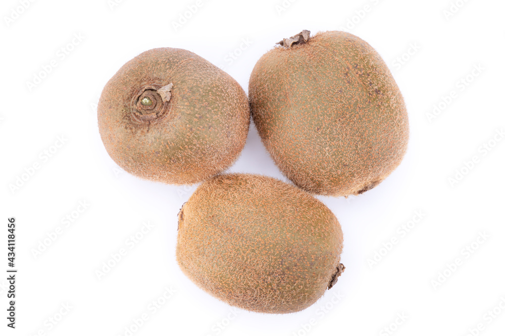 Three whole kiwi on white background top view, isolated Three whole kiwi on white background top view, isolated