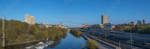 The canal Karlbergs kanalen in Stockholm with residential and office buildings a sunny spring morning