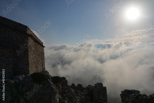 Castle up to clouds and sunshine in a Greek island