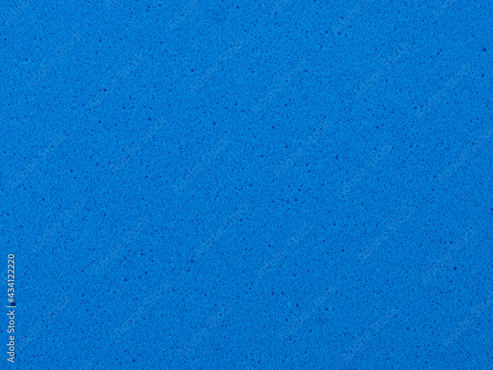 Blue sponge texture and background. Close-up sponge.
