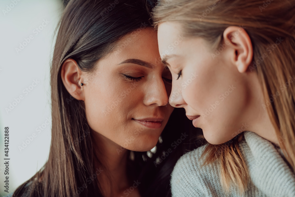 Diverse friends girls lesbian couple hugging. Stylish cool generation z women dating in love enjoy romantic relationships Diverse friends girls lesbian couple hugging. Stylish cool generation z women dating in love enjoy romantic relationships