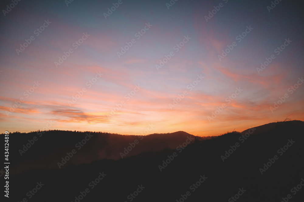 Sunset in the mountains. View of Mount Pikuy. Ukrainian Carpathians in spring.