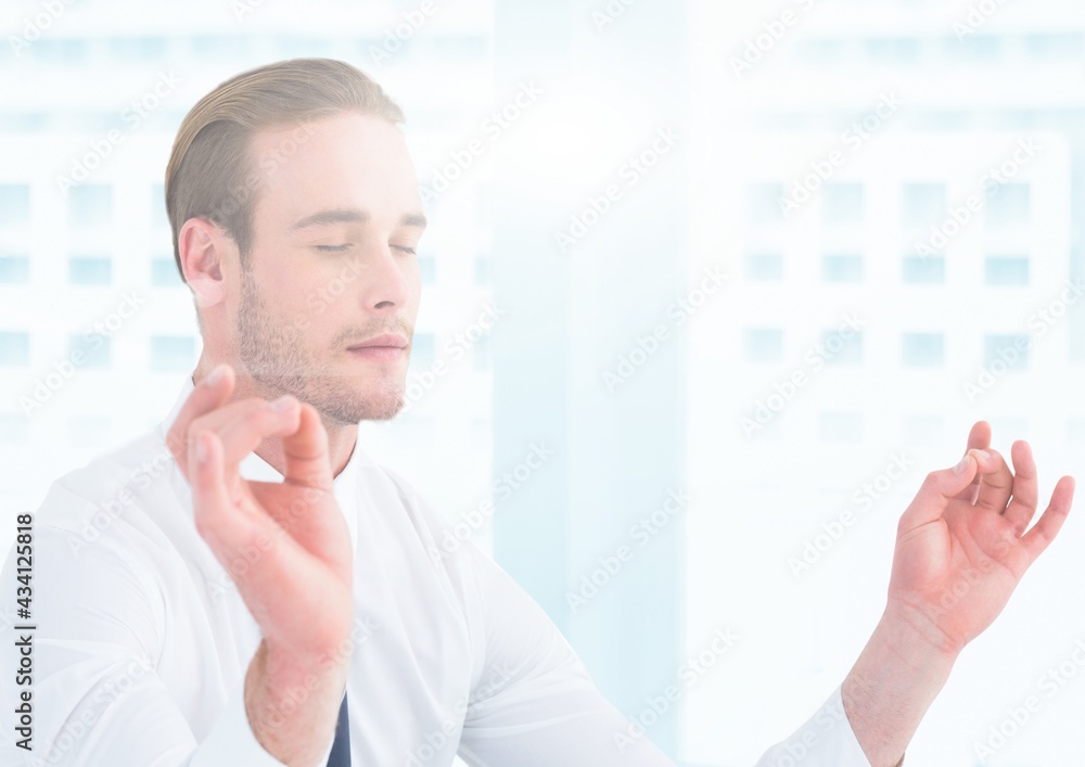 Fototapeta premium Composition of businessman with eyes closed meditating with blue spots of light in background