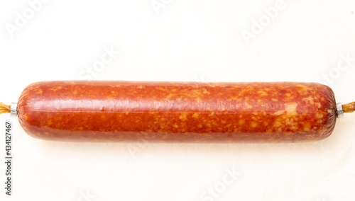 smoked sausage on a light background