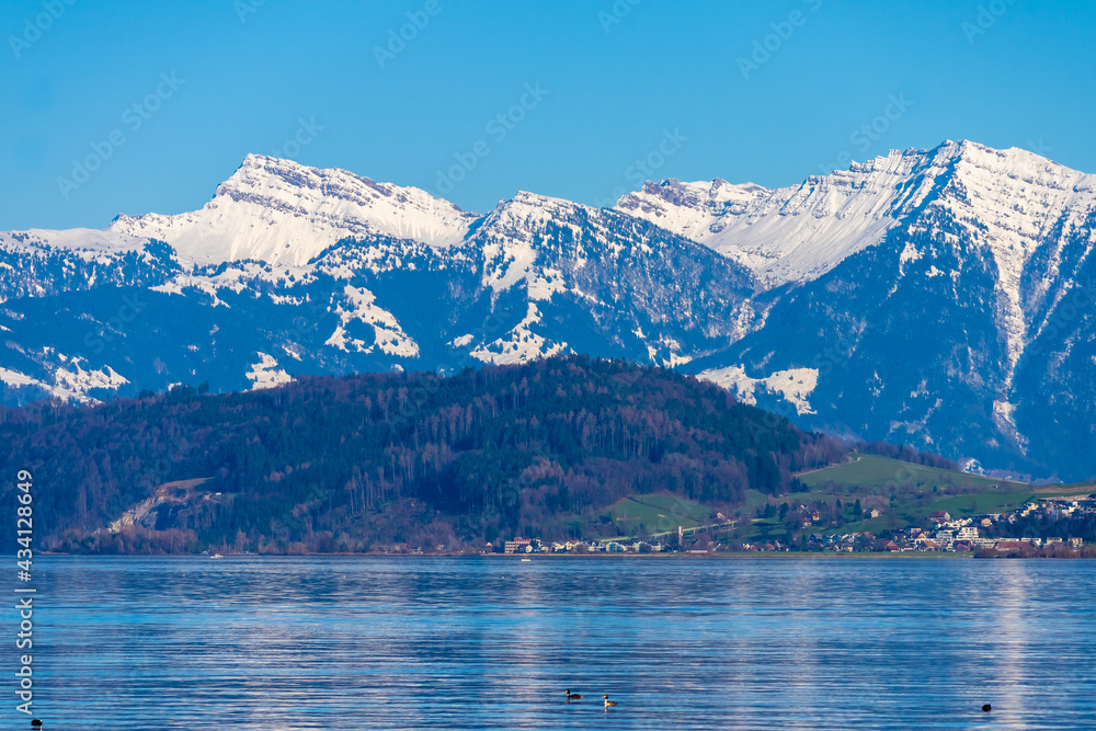 Stunning alpine landscapes along the shores of the Upper Zurich Lake with the iconic Santis peak in the background, Rapperswil-Jona, St. Gallen, Switzerland