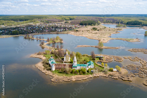 View of the Trinity Ostrovo-Yezersk Convent in Vorsma in the Nizhny Novgorod region photo