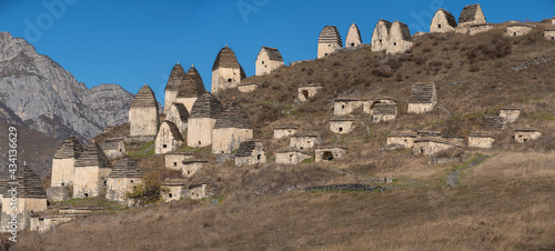 Dargavs is the city of the dead. Medieval necropolis in the Caucasus Mountains photo