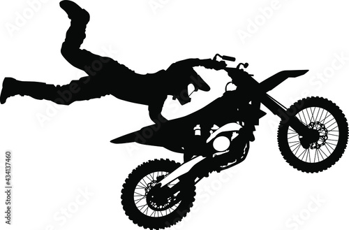 Silhouette of a motorcyclist performing a stunt on a motorcycle vector illustration
