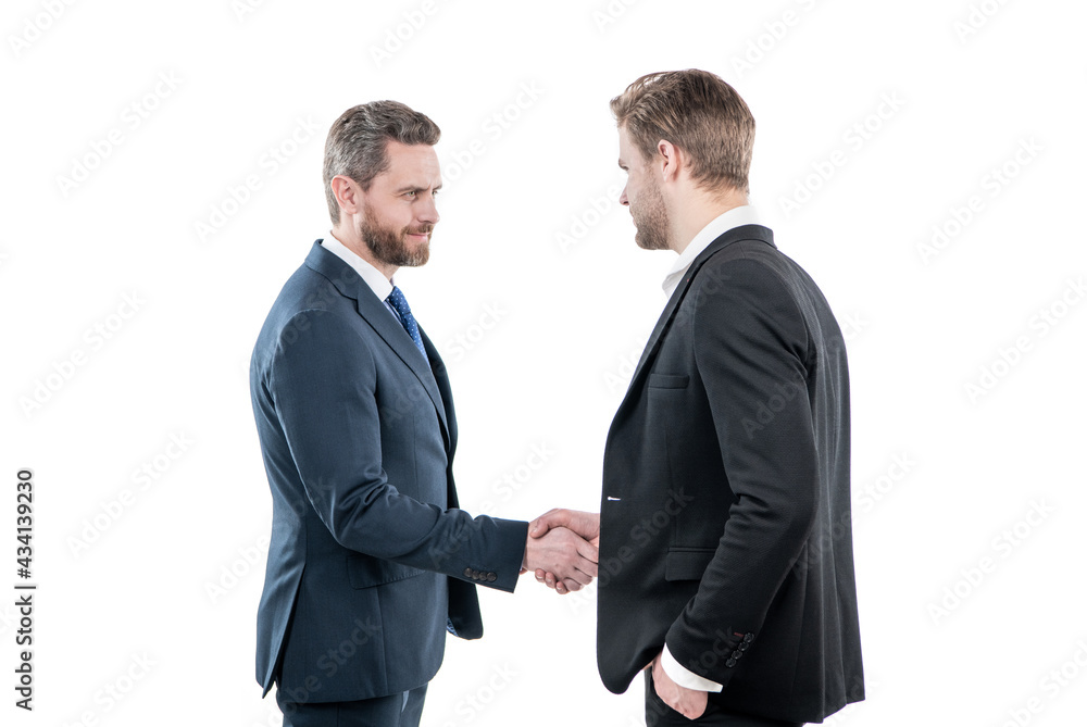 two men shaking hands. businessmen on meeting. boss and employee. partners after business deal. two men shaking hands. businessmen on meeting. boss and employee. partners after business deal.