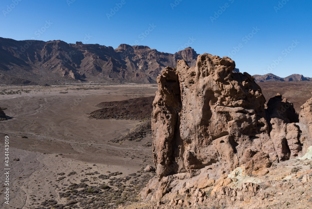 View to lava field and volcanic formation in Roques de Garcia area  in Teide National Park, Tenerife, Canary Islands, Spain
