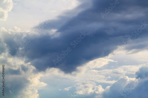 Fototapeta Naklejka Na Ścianę i Meble -  stormy grey and white clouds on blue sky background