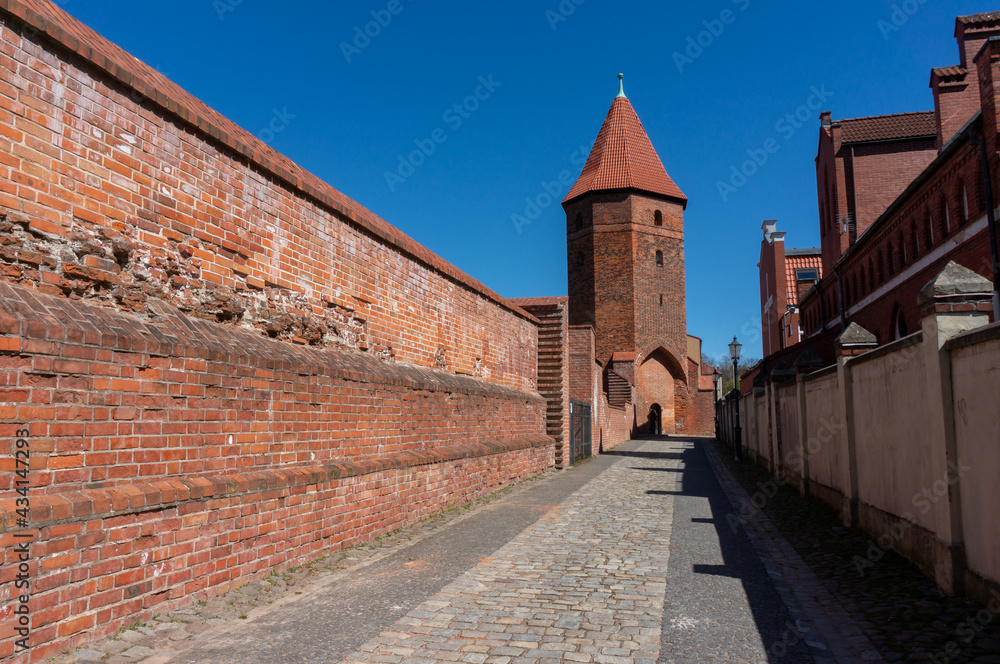Medieval defensive wall and the best-preserved Ivy Tower (Baszta Bluszczowa). Lebork, Poland.