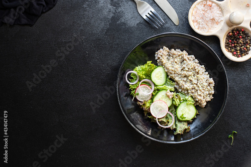 green buckwheat salad vegetables lettuce mix meal snack copy space food background rustic. top view diet vegan or vegetarian food