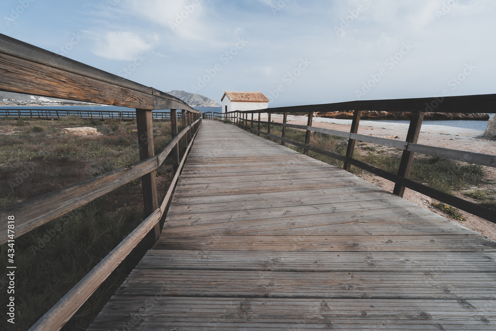 Closeup shot of a wooden path near the Mediterranean sea in Spain