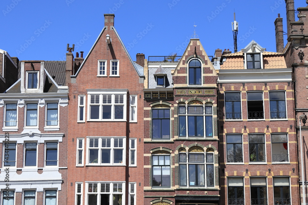 Amsterdam Schippersgracht Canal House Facades Against a Blue Sky