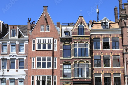 Amsterdam Schippersgracht Canal House Facades Against a Blue Sky
