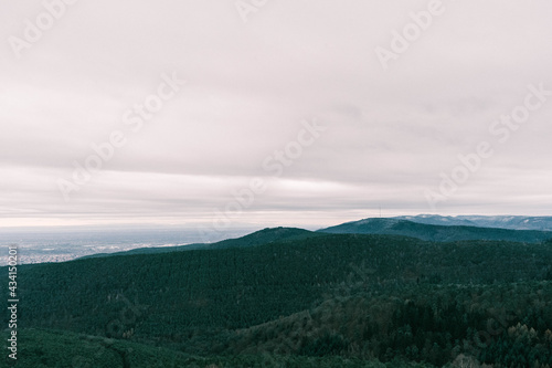clouds over the mountains in the palatinate forest