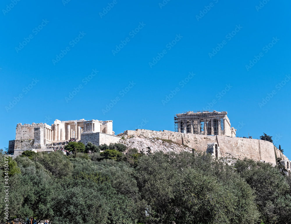Parthenon on Acropolis of Athens Greece, under clear blue sky, space for your text