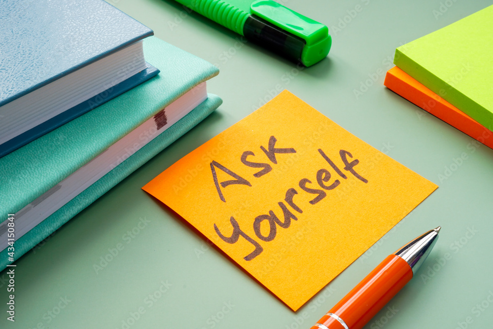 Motivational sign Ask yourself on the workplace. Motivational sign Ask yourself on the workplace.