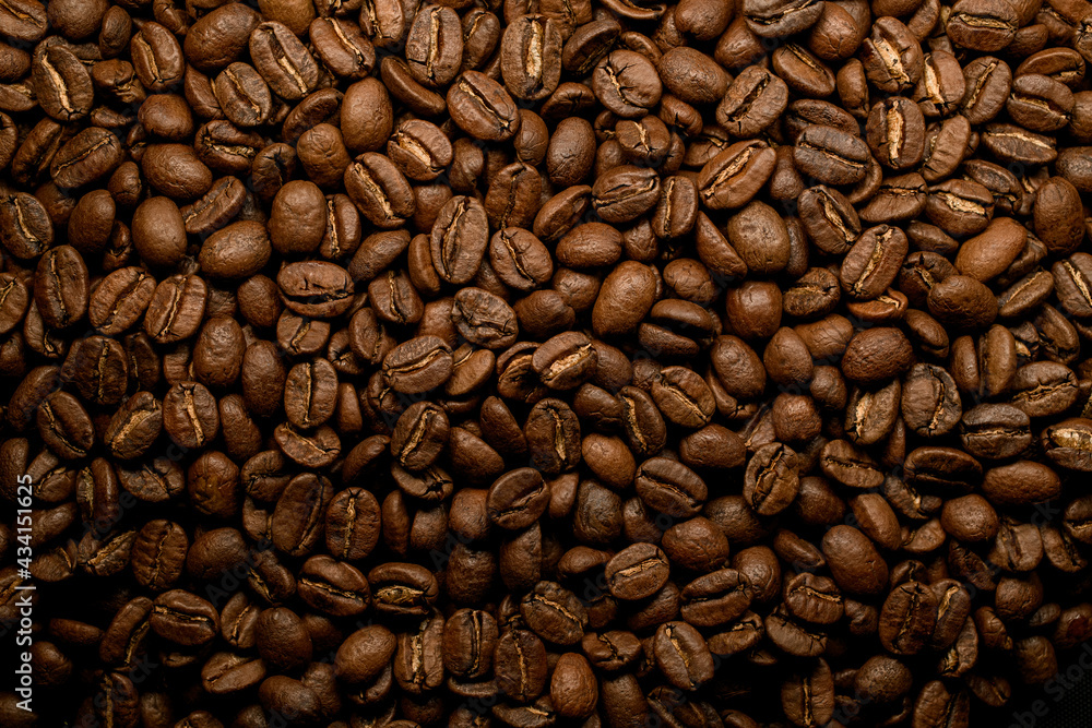 Obraz premium Great composition of brown roasted coffee beans. Can be used as background.
