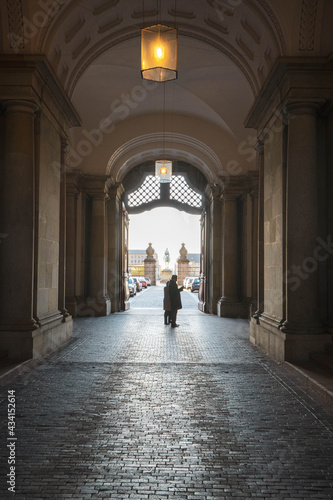 person walking through the corridor