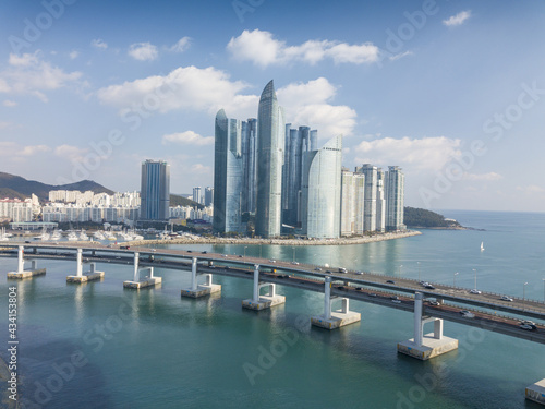 Gwangandaegyo bridge on background of the cityscape of Busan, South Korea photo