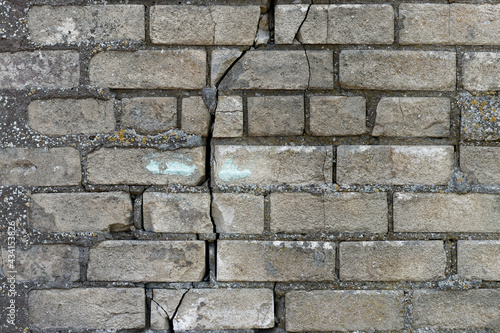 Old cracked brick wall