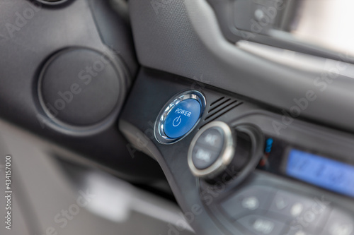 close-up of keyless car ignition button, hybrid vehicle