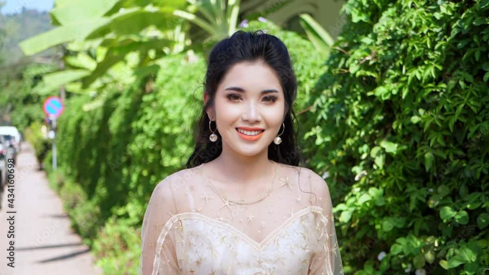 Young Asian Woman Smiling And Walking , Slow Motion
Young Asian Woman Smiling And Walking , Slow Motion