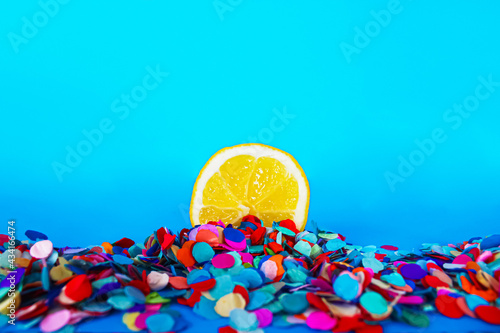 Lemon sunset on confetti beach, summer concept