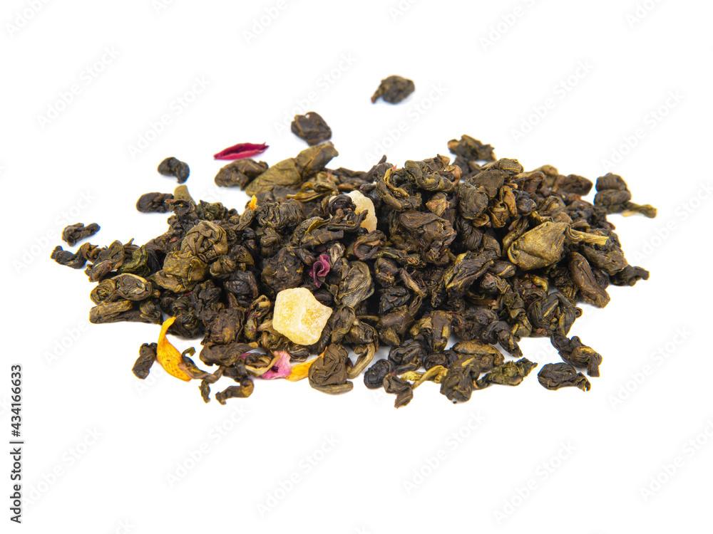 Aromatic green dried tea leaves with mango isolated on the white background Aromatic green dried tea leaves with mango isolated on the white background