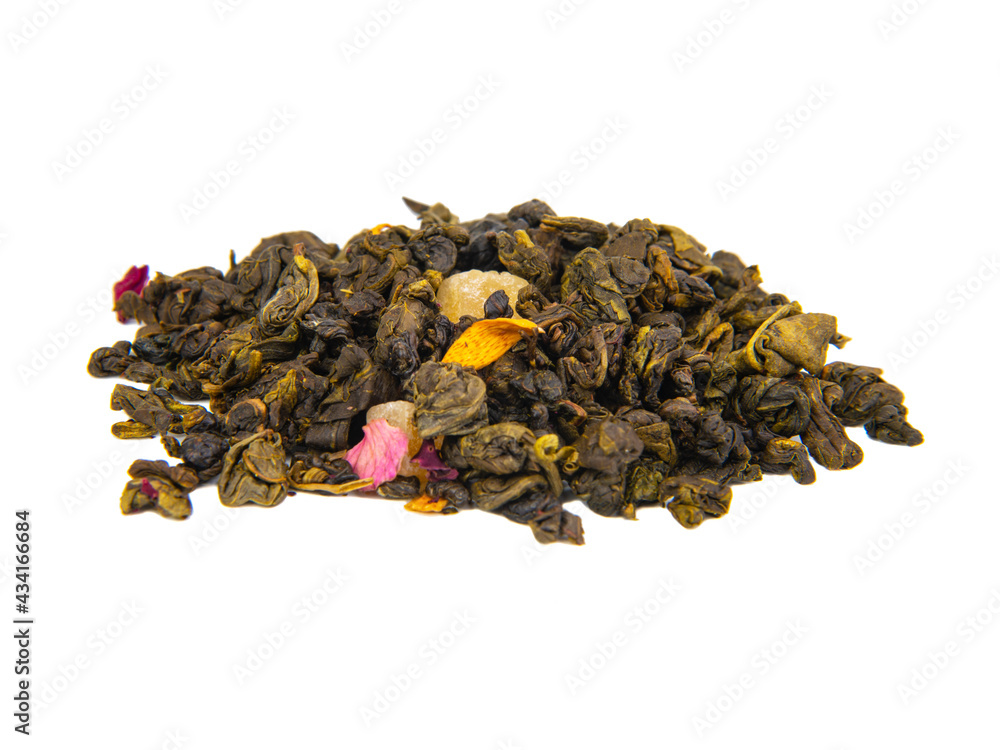 Aromatic green dried tea leaves with mango isolated on the white background Aromatic green dried tea leaves with mango isolated on the white background