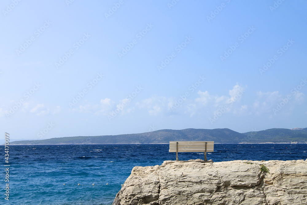 White bench near Adriatic sea , Croatia
